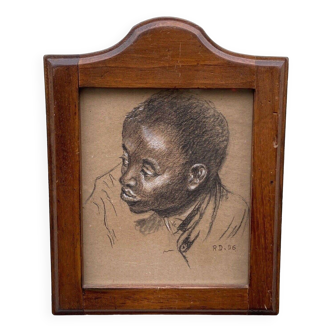 Tableau ancien portrait de garçon noir au fusain cadre en bois signé RD 96