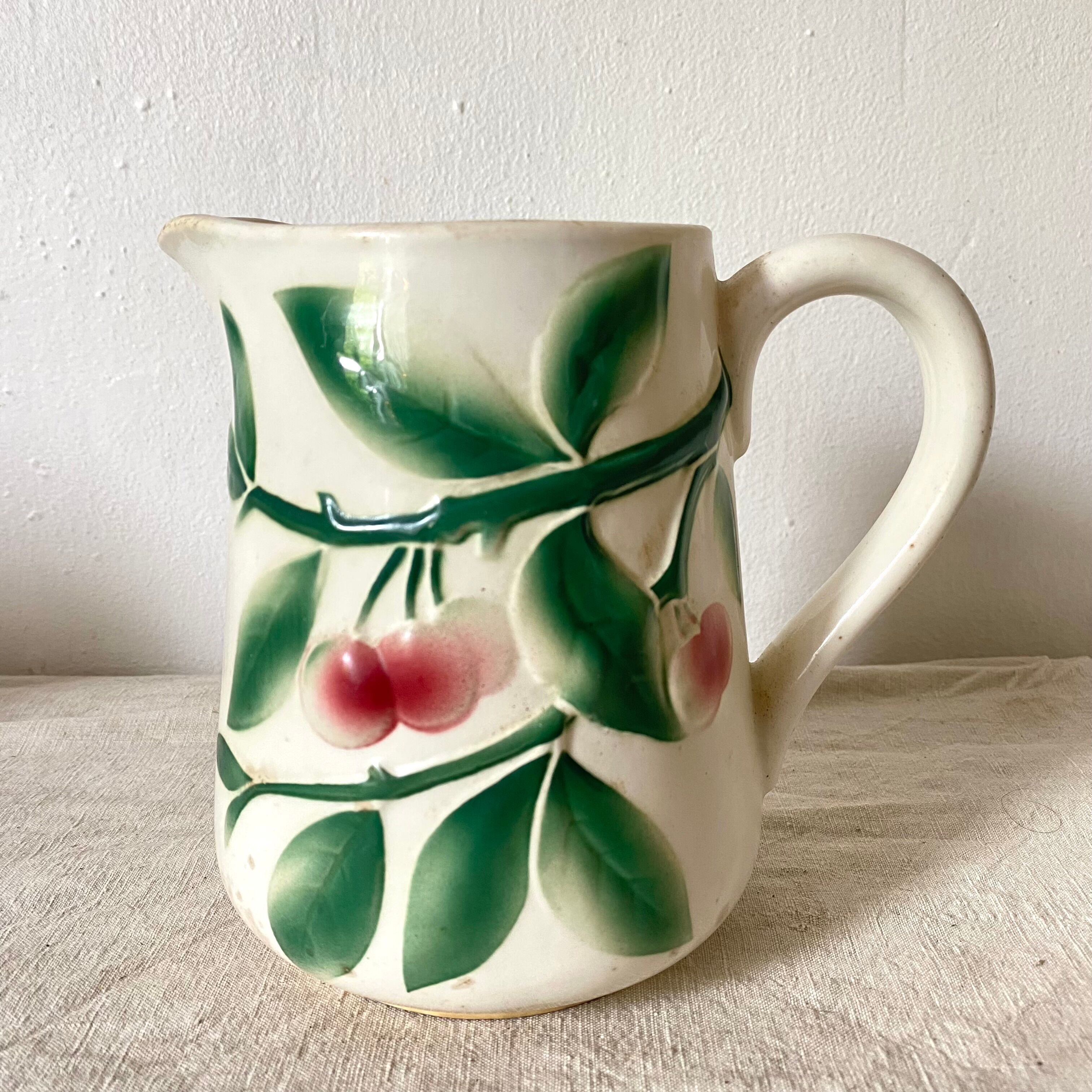 Antique pitcher in Digoin Cherry slip