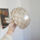 Lotus flower suspension in mother-of-pearl and brass