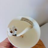 Lustre forme fleur en rotin