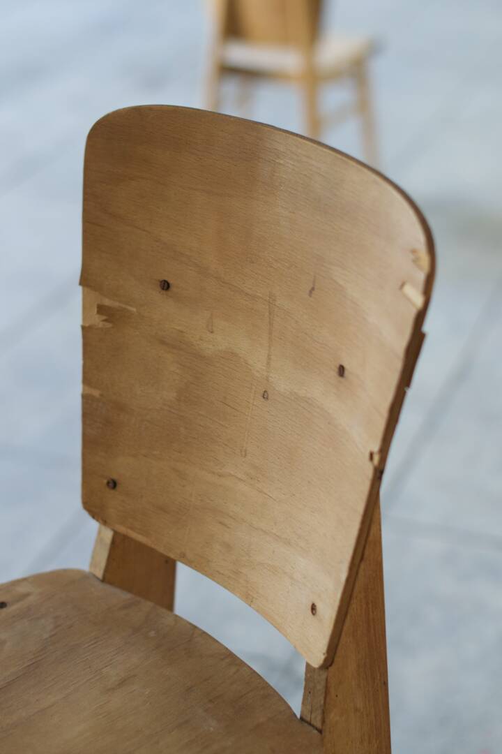 two  style wooden chairs