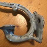 Enamelled cast iron coat hook