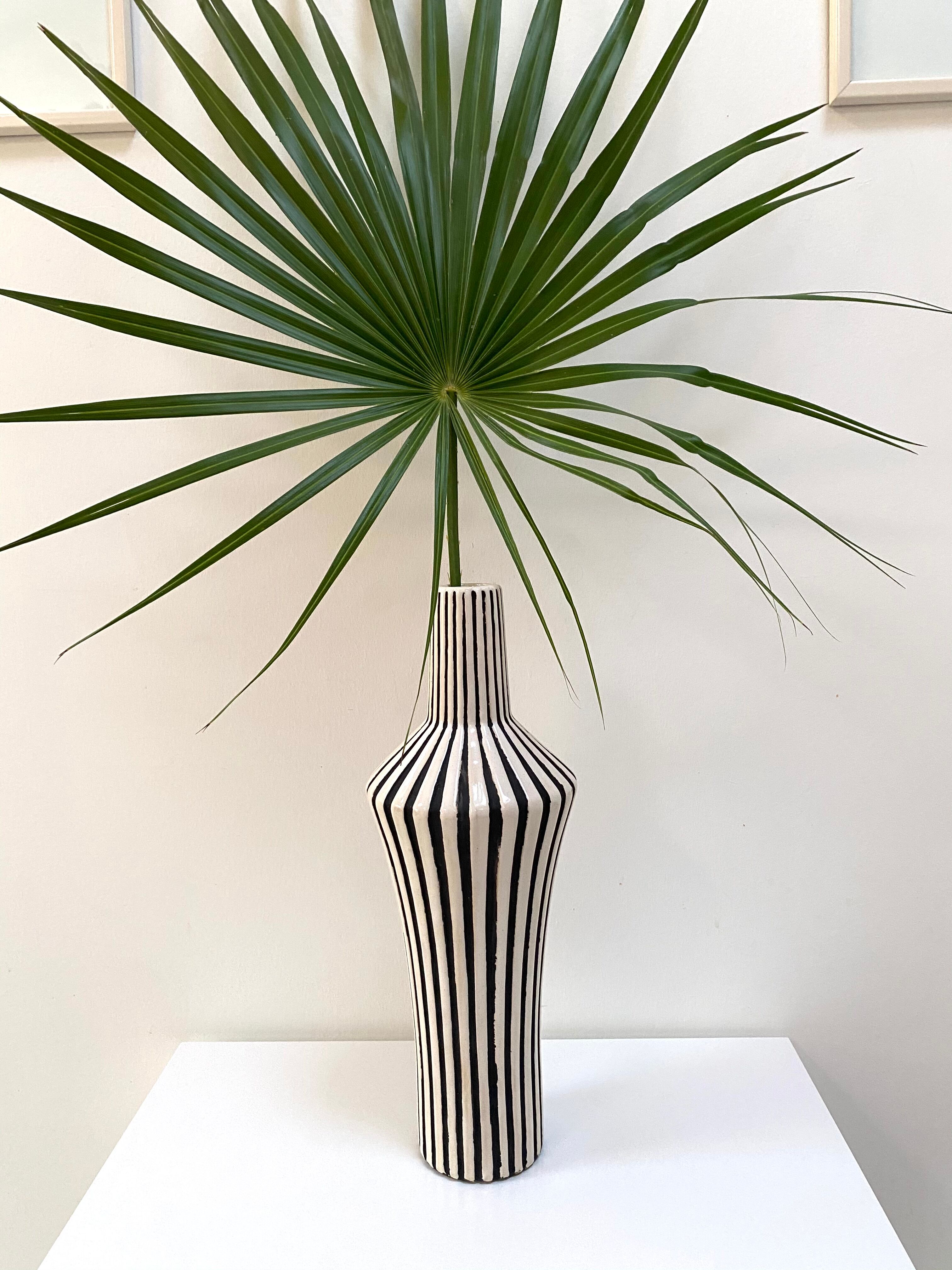 Graphic ceramic vase with black and white stripes