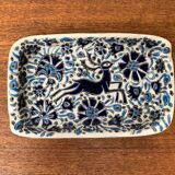 Vintage handmade blue ceramic ashtray with deer and flower ornament from Rodos Ceramics.