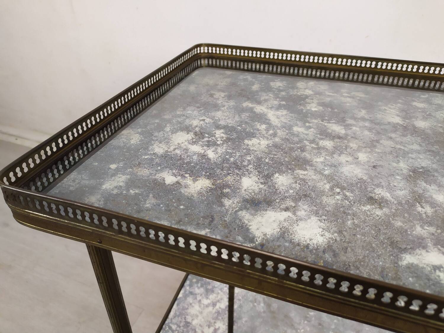 Brass and glass rolling trolley