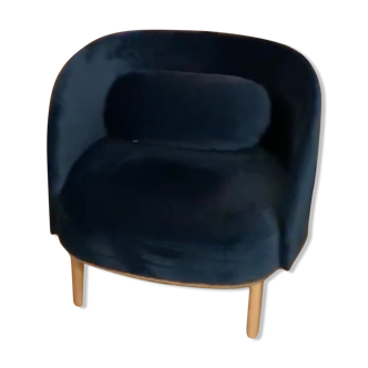 Modern blue velvet armchair