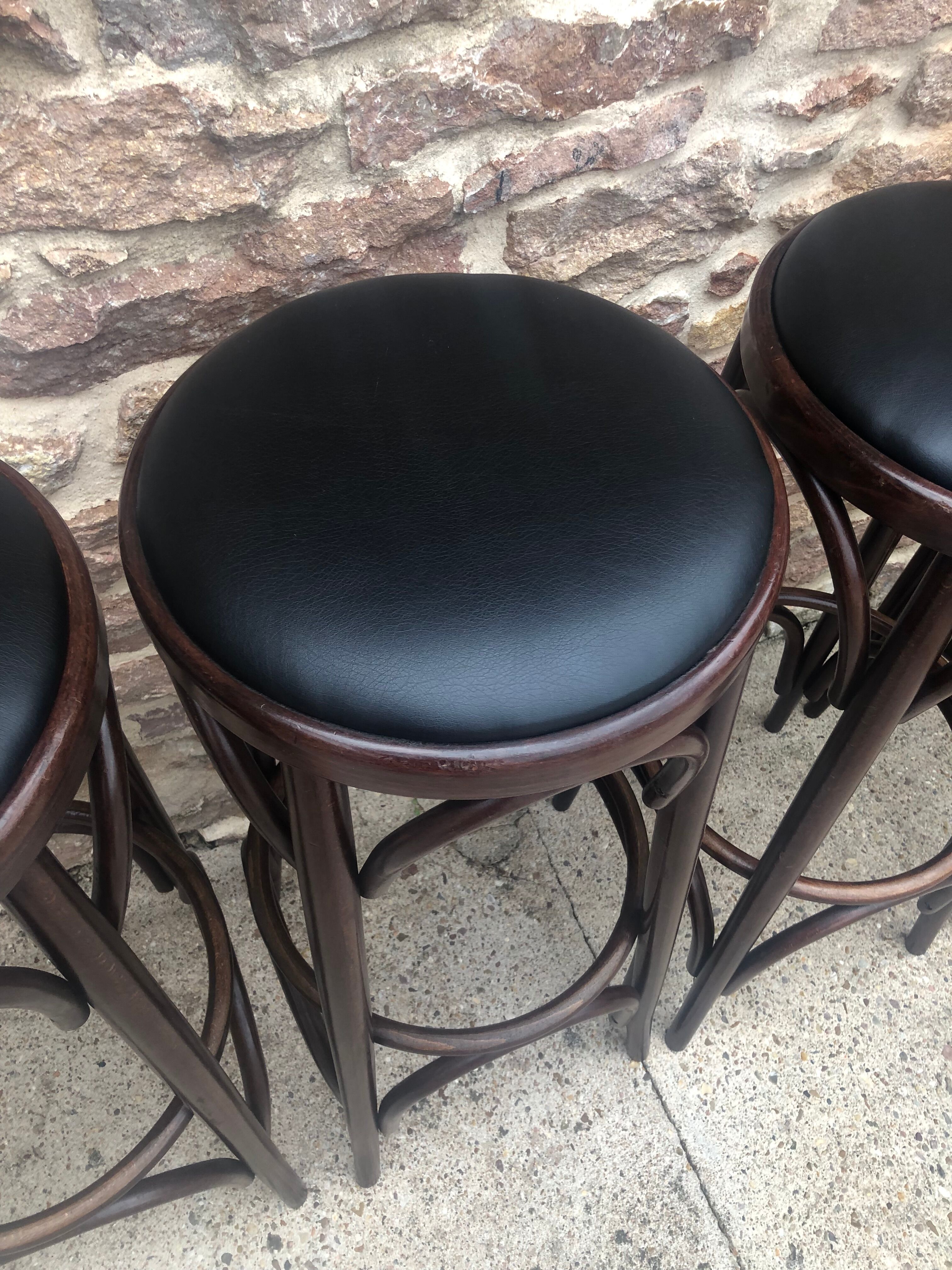 Suite of 4 bar stools