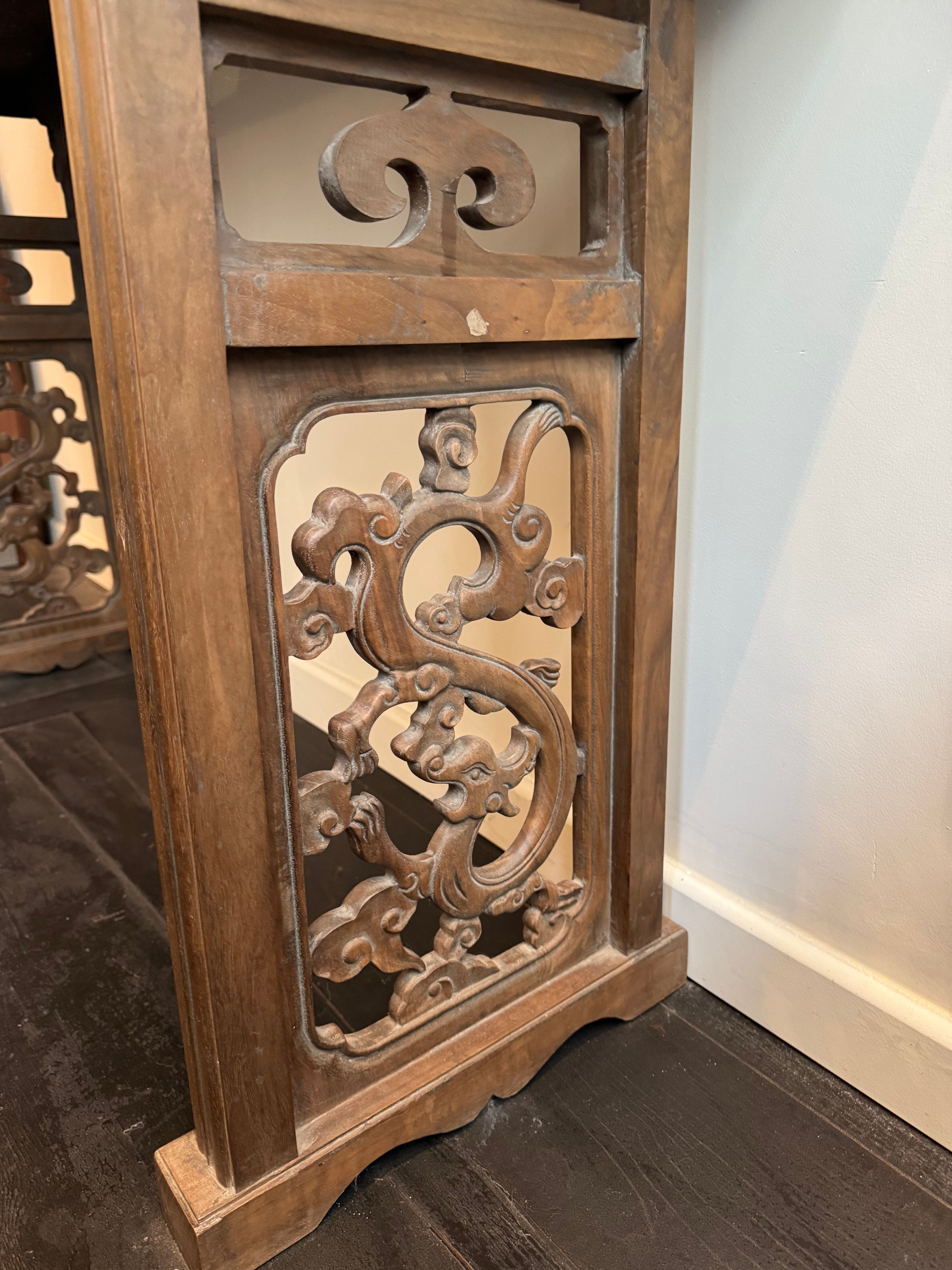 Chinese console in ancient elm, carved openwork legs and top g