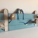 Coat rack with vintage swallows