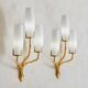 Pair of wall lights by Maison Arlus by Felix Agostini in bronze.