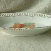 Pierced porcelain basket decorated with fruit still life.