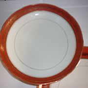Lot assiette et plat en porcelaine de Limoges avec liseré orange et or
