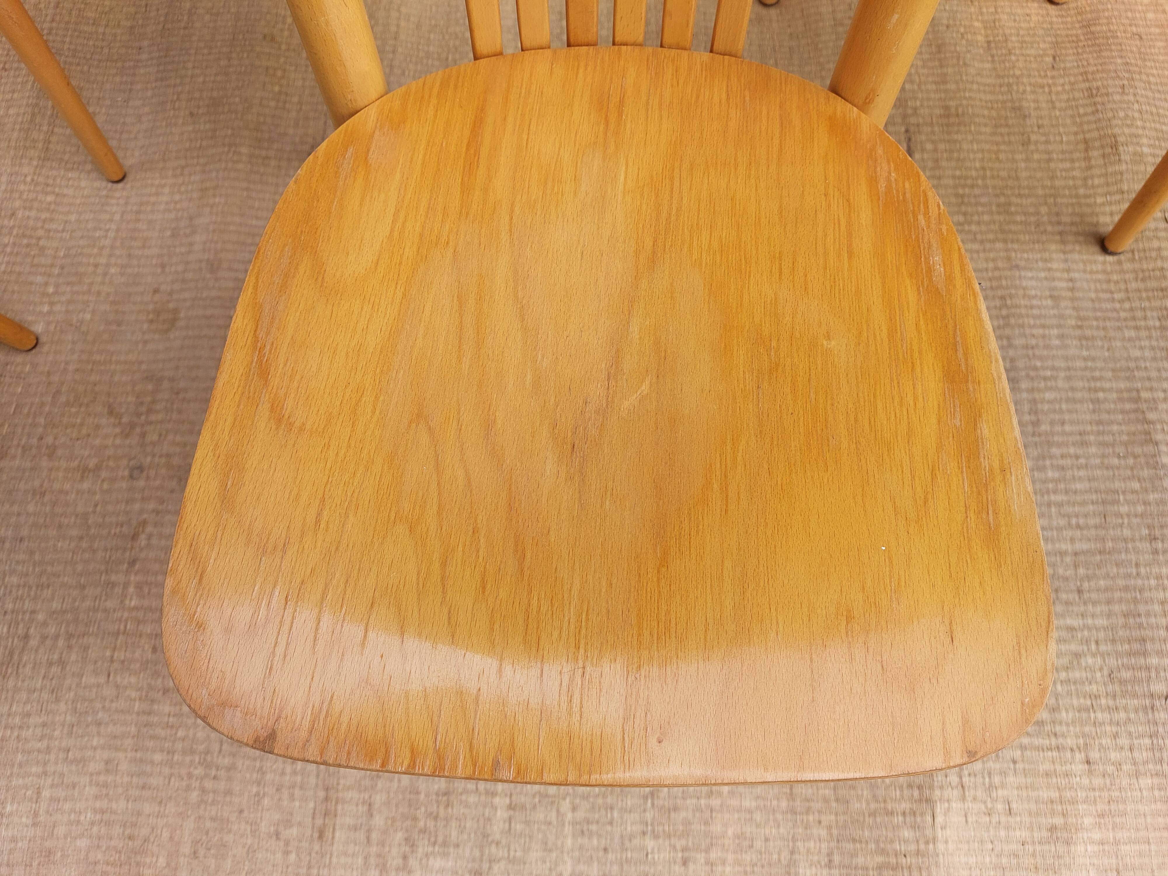 4 light wood bistro chairs