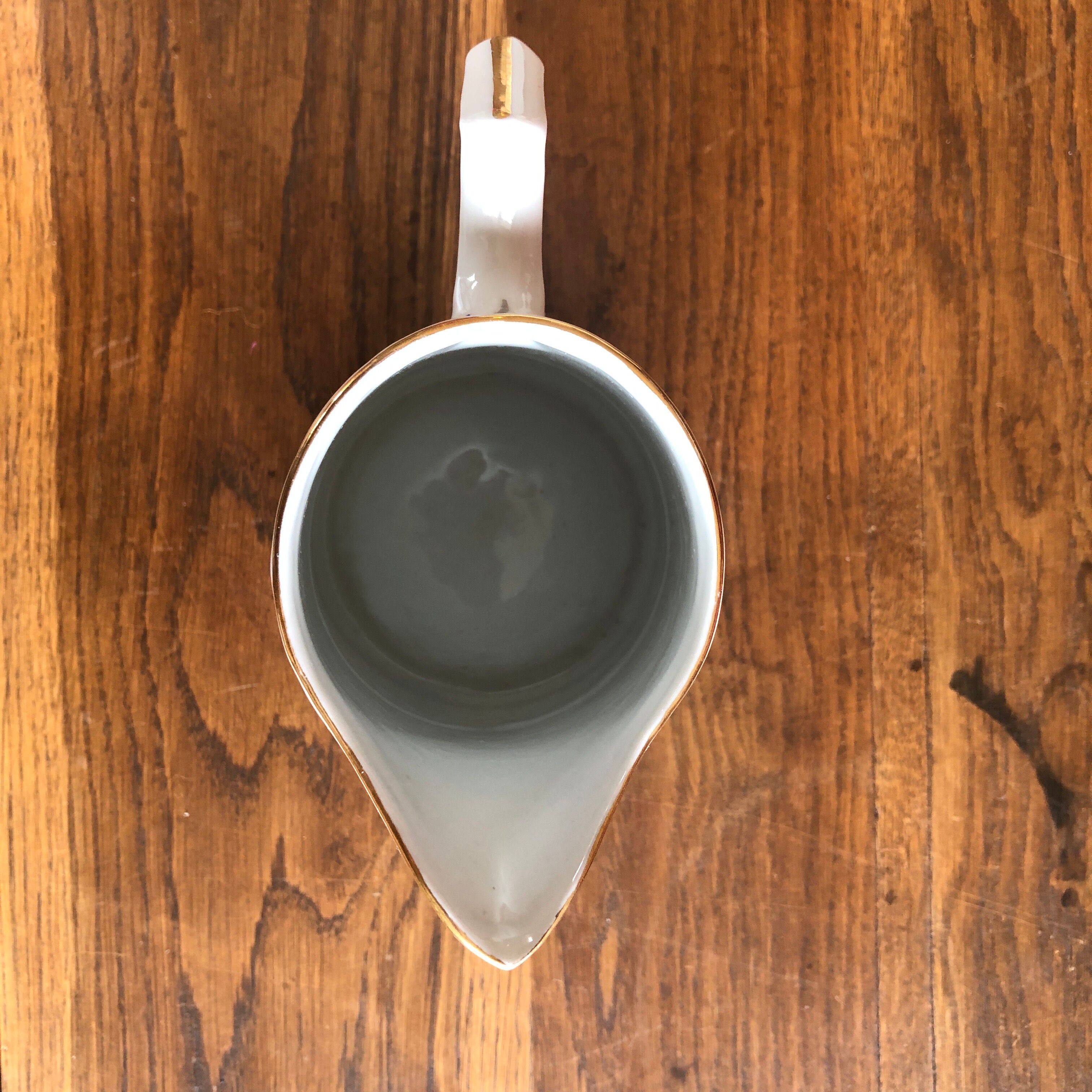 Porcelain pitcher with flowers
