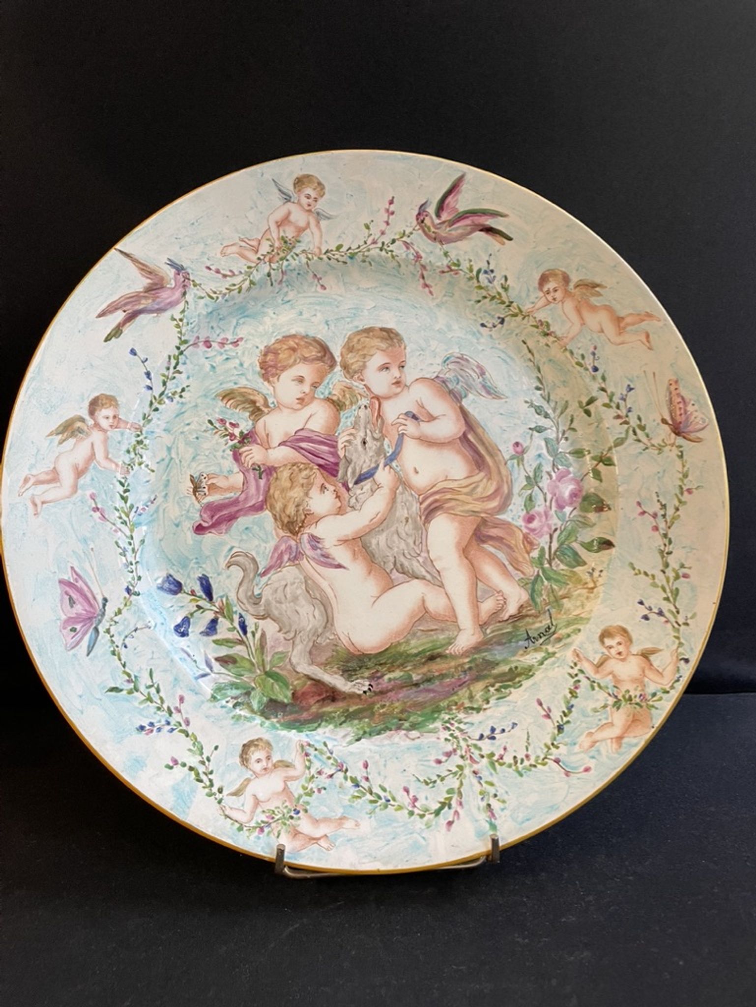Round earthenware dish - hand decoration signed and marked