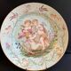 Round earthenware dish - hand decoration signed and marked
