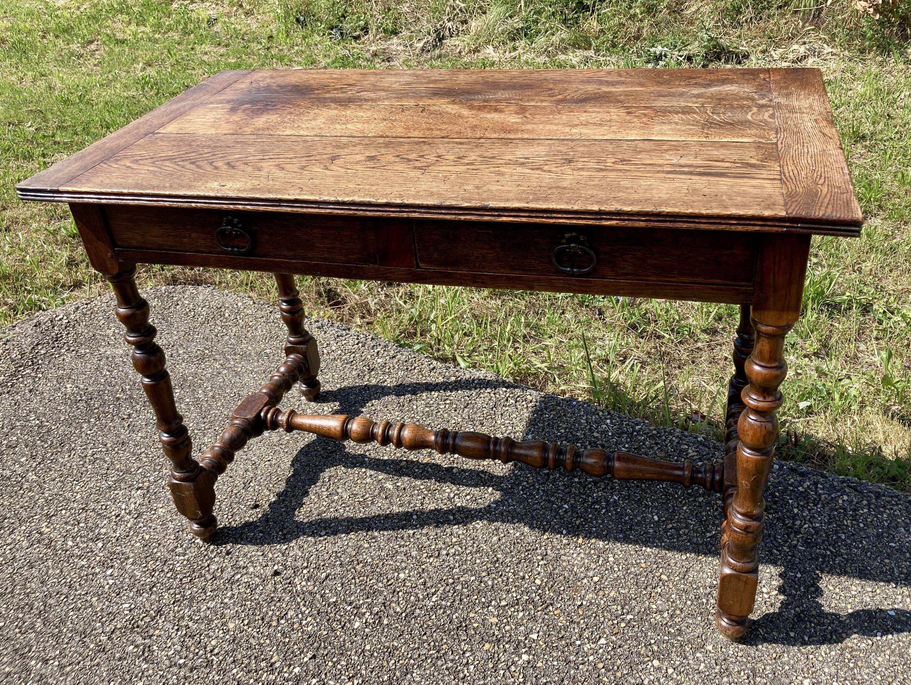 Rustic desk with two drawers with brace and turned legs