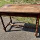 Rustic desk with two drawers with brace and turned legs