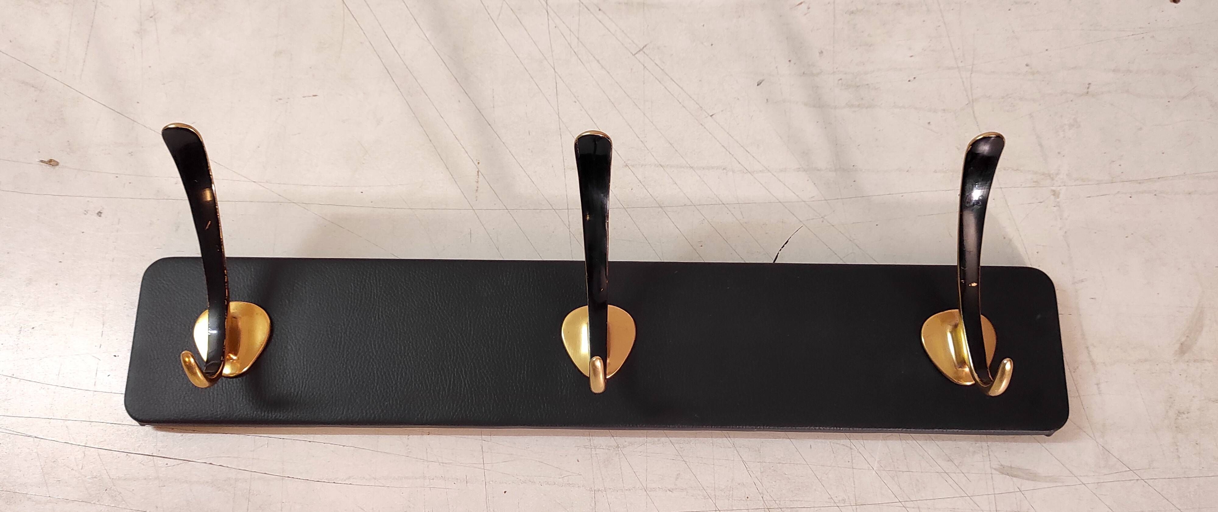 Wall-mounted coat rack in brass, 1950s-60s