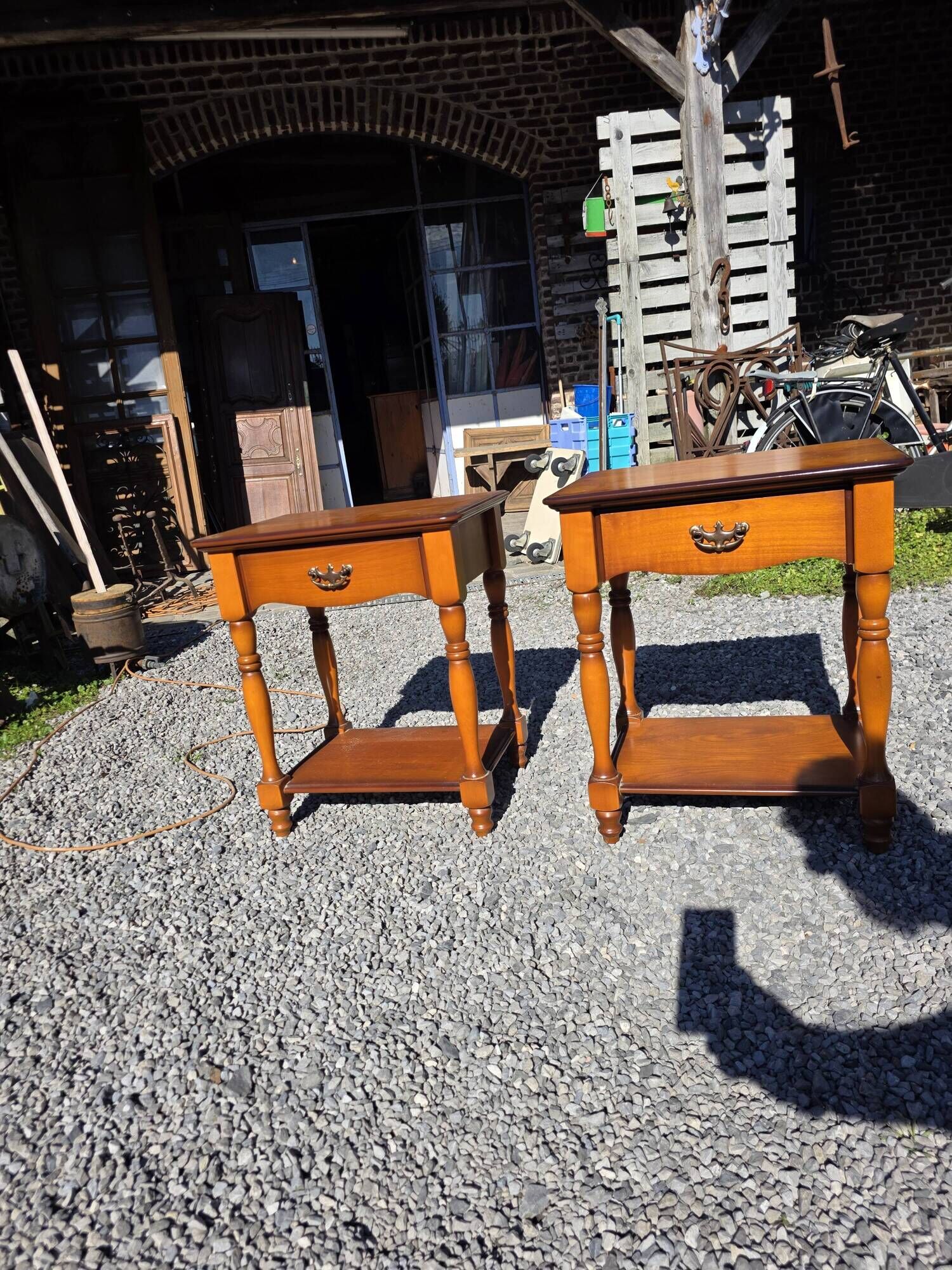 Pair of cherry wood bedside tables from the mid-20th century.