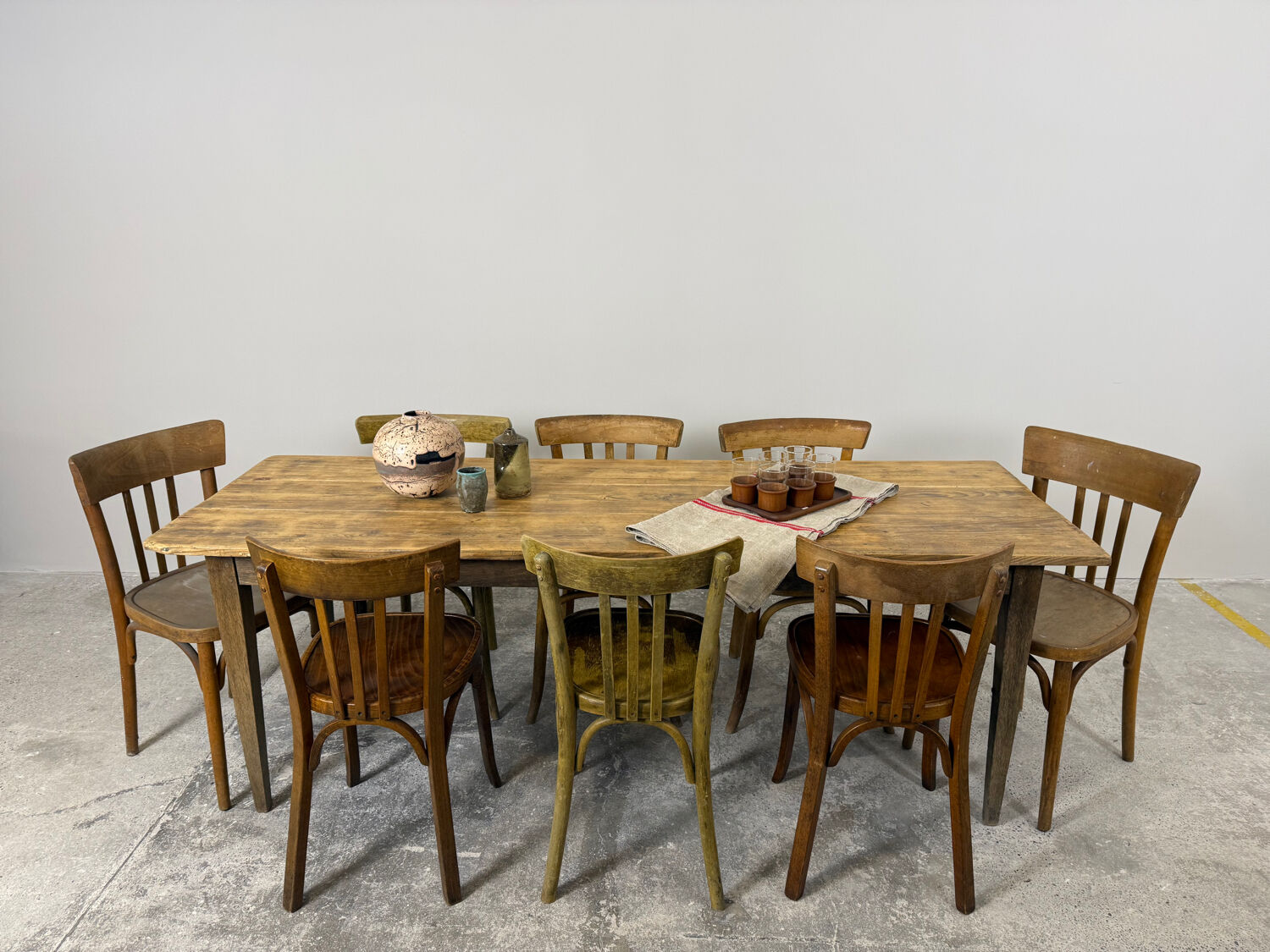 Old farmhouse table with tapered legs, late 19th to early 20th century.