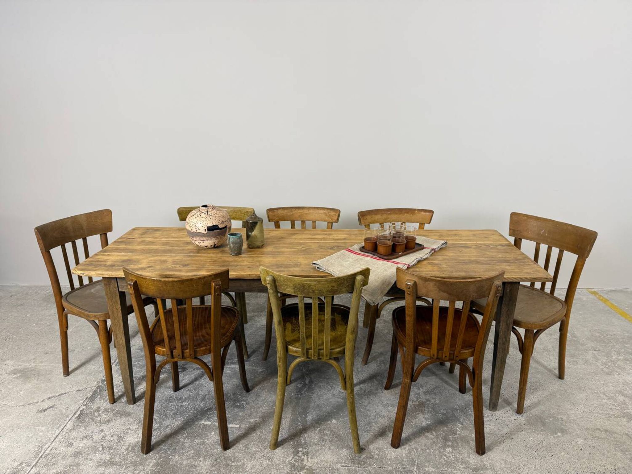 Old farmhouse table with tapered legs, late 19th to early 20th century.
