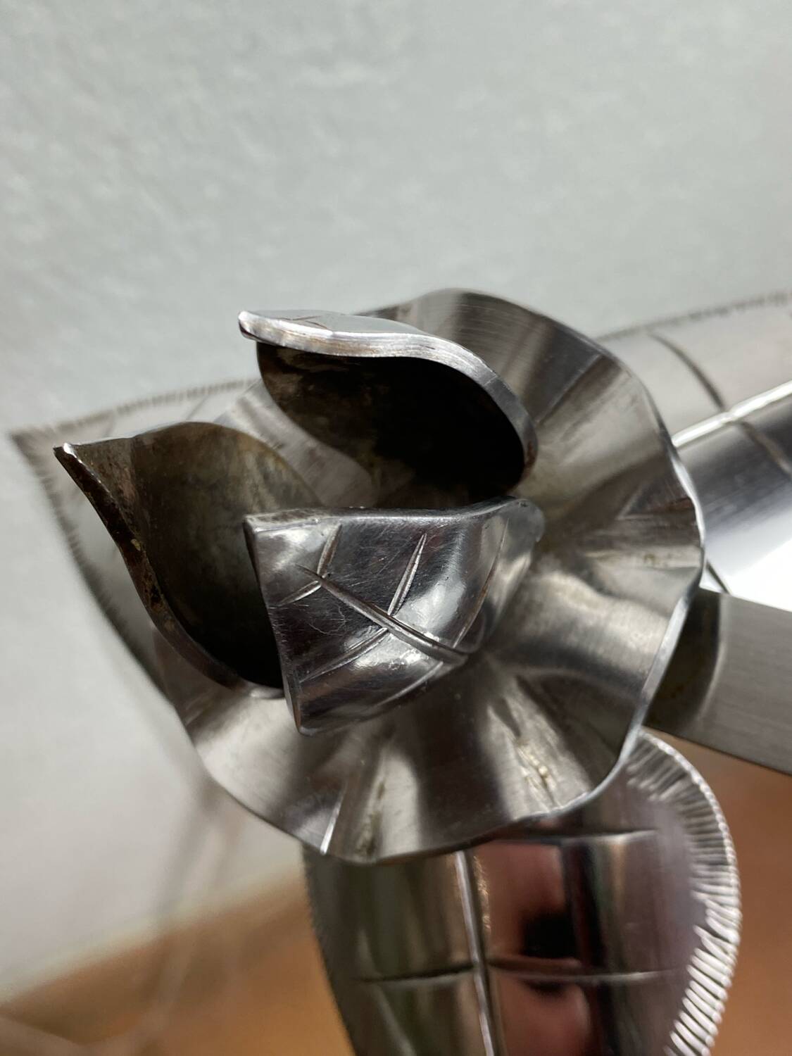 Silver-plated metal flower candle holder