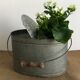 Old zinc stud, fisherman's live bucket