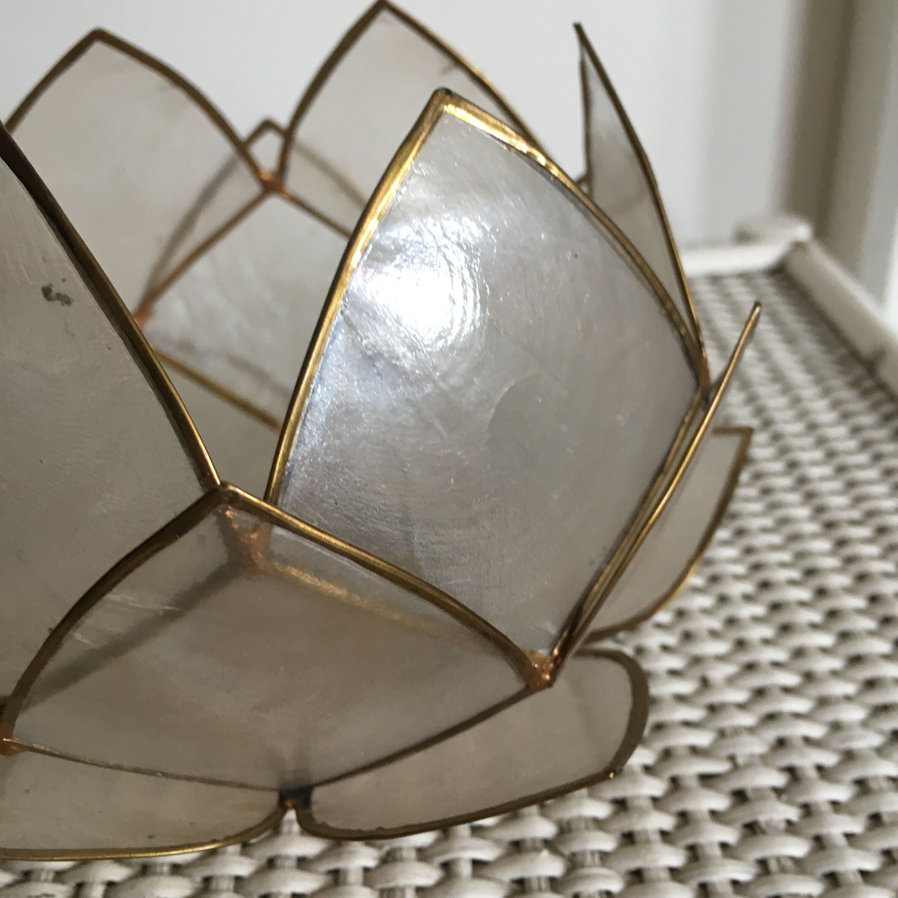 Candlestick or candle holder in nacre flower shape