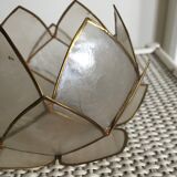 Candlestick or candle holder in nacre flower shape