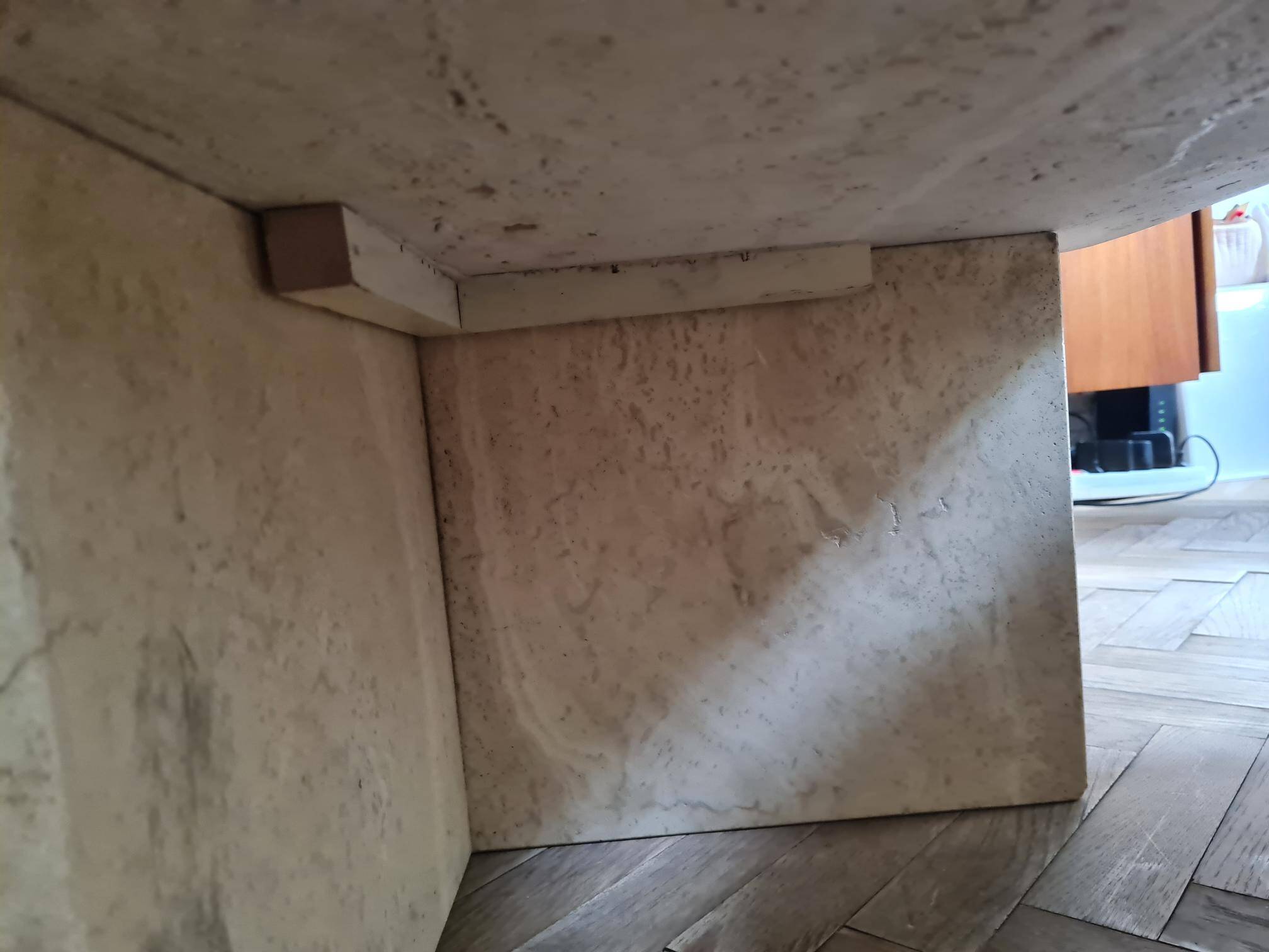 Pair of travertine nesting tables