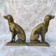 Paire de chenets chiens en laiton