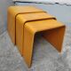 Nested tables with curved wood