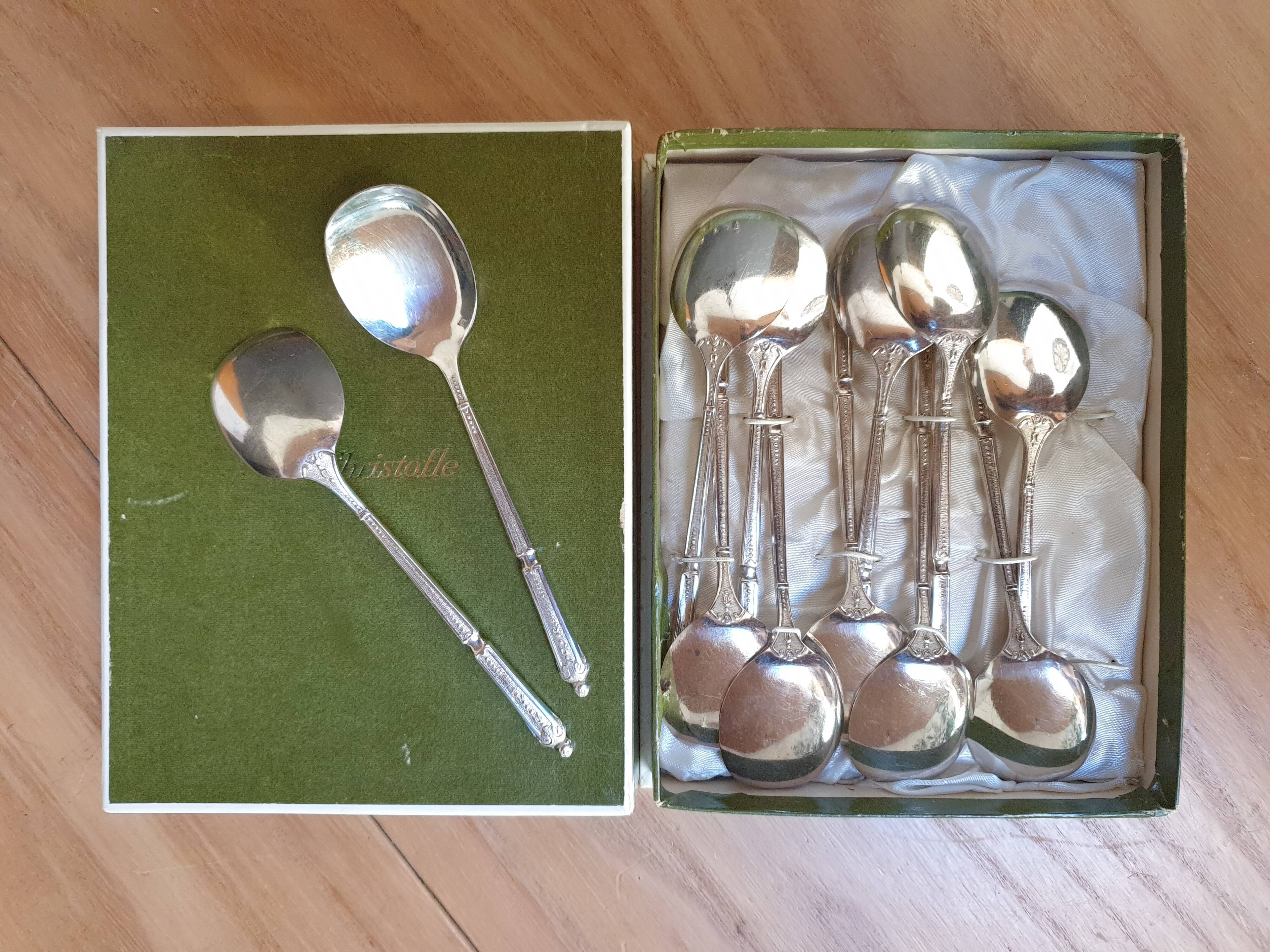 Punched silver metal ice spoons
