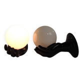 Pair of vintage 1970s wall sconces – Black hands holding an opaque globe