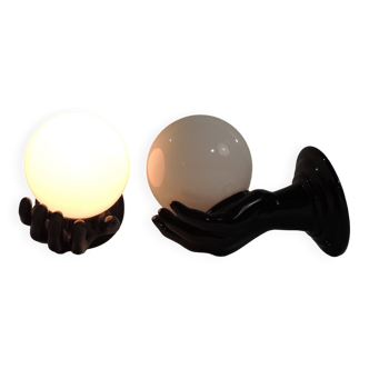 Pair of vintage 1970s wall sconces – Black hands holding an opaque globe