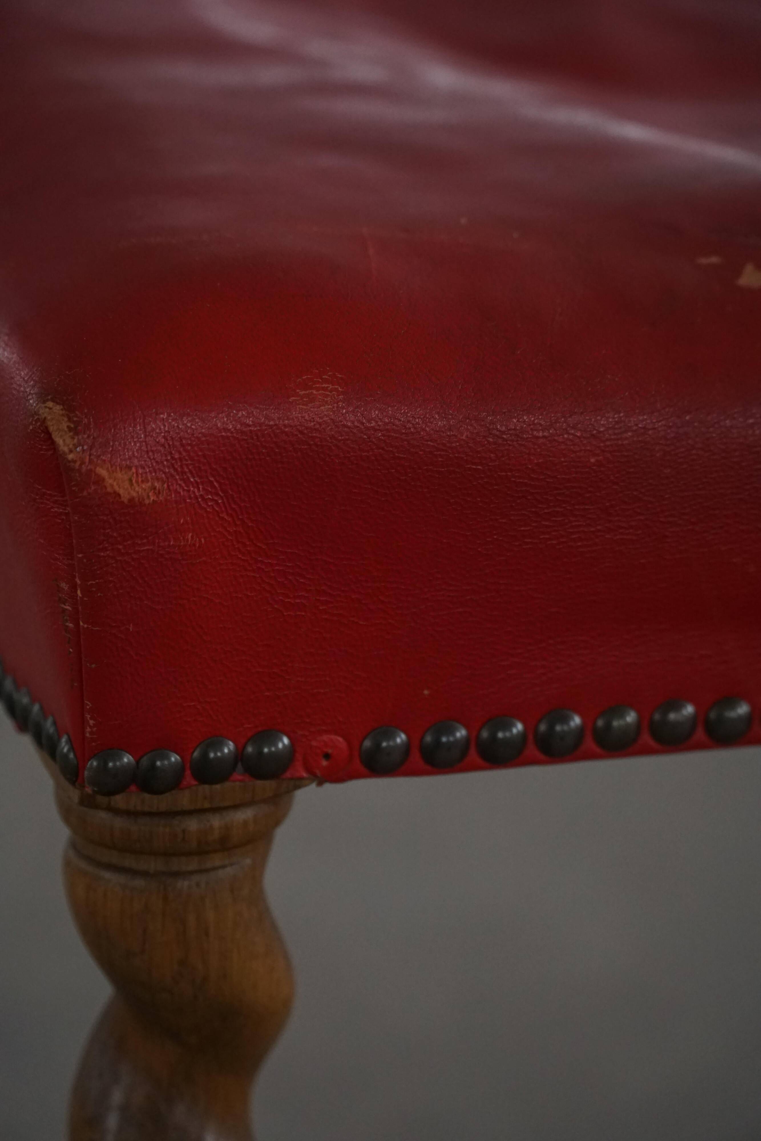 Twisted barley stool in Danish baroque oak with a red leather seat, early 20th century.