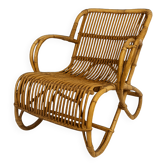 Vintage rattan armchair from the 1960s-1970s.