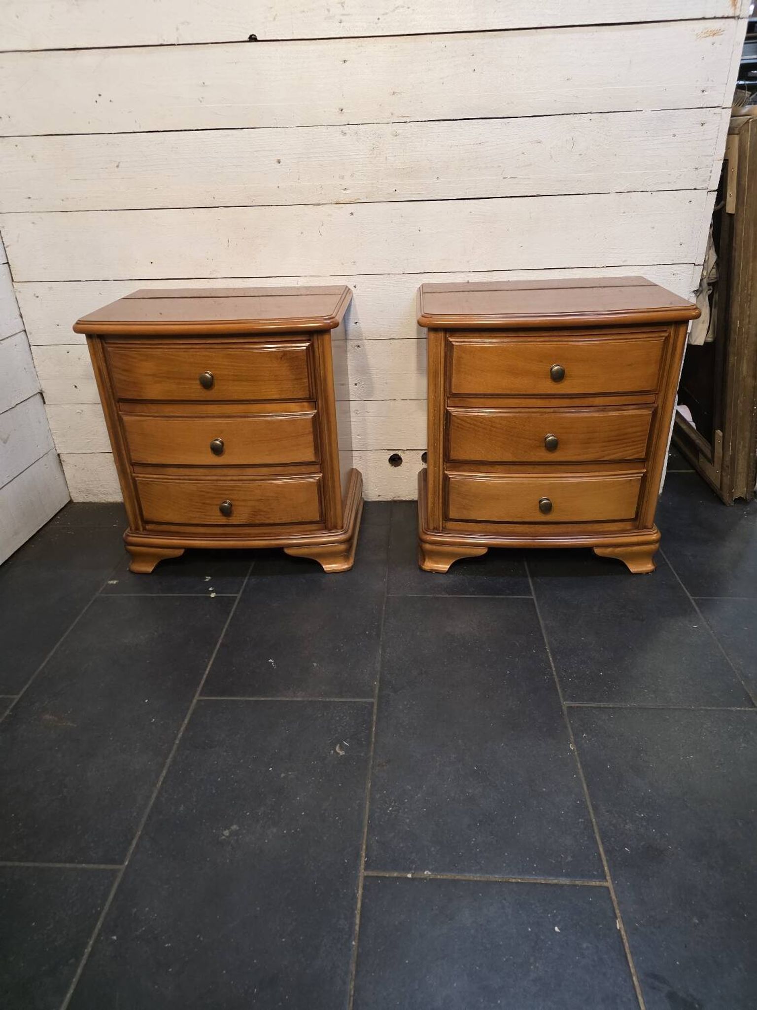 Pair of Louis Philippe style bedside tables in cherry wood.