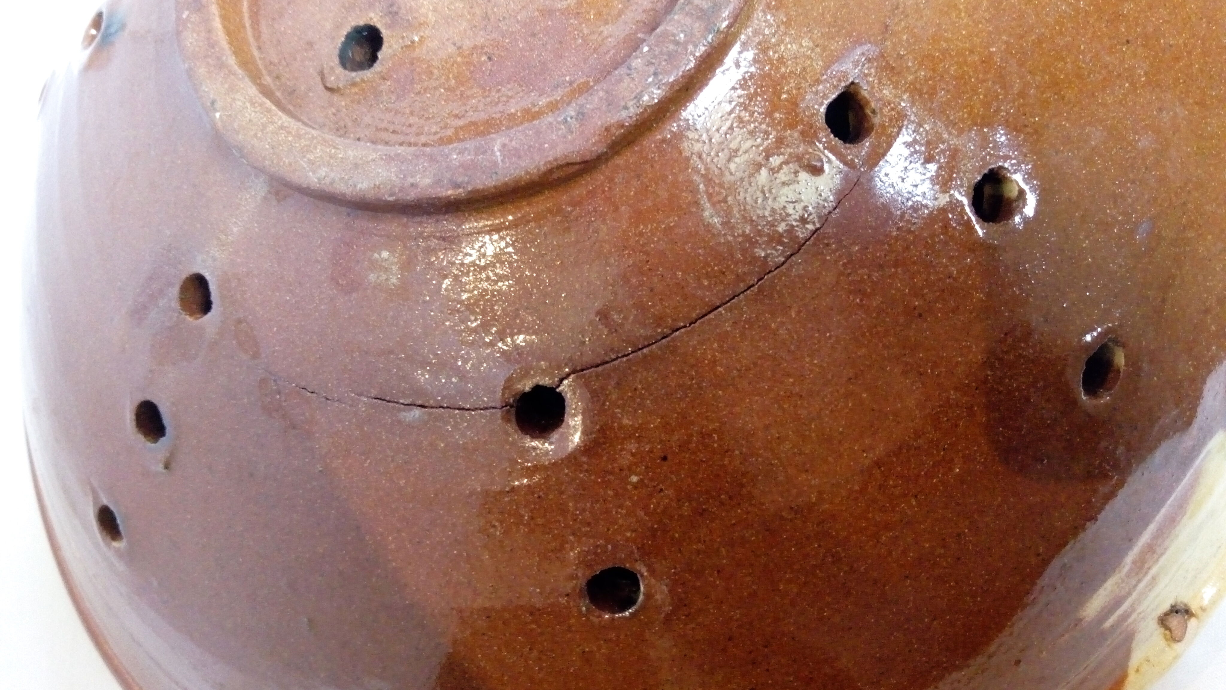 Yellow and green ceramic drain plate