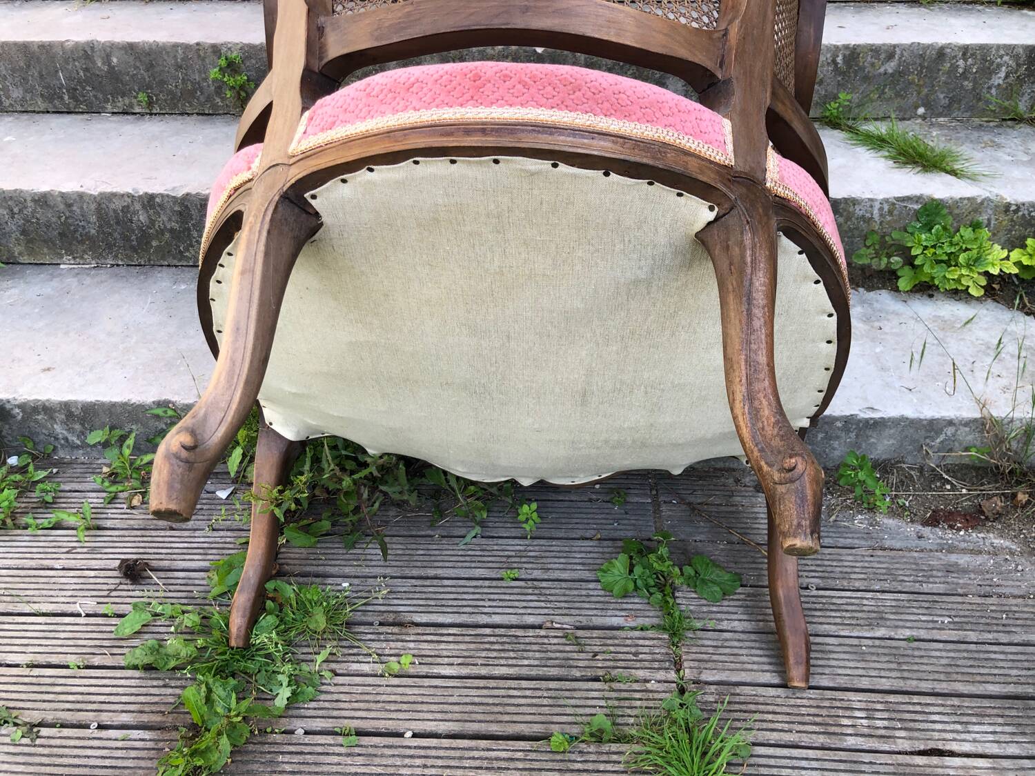 Louis XV style walnut and cane armchair