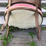 Louis XV style walnut and cane armchair