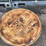 Old wooden saddle pedestal table with claw feet