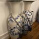 Set of two very large white and blue ceramic vases.