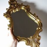 Vintage Rococo wall mirror, gold, Italy, circa 1950-1970, wood and gilded stucco.