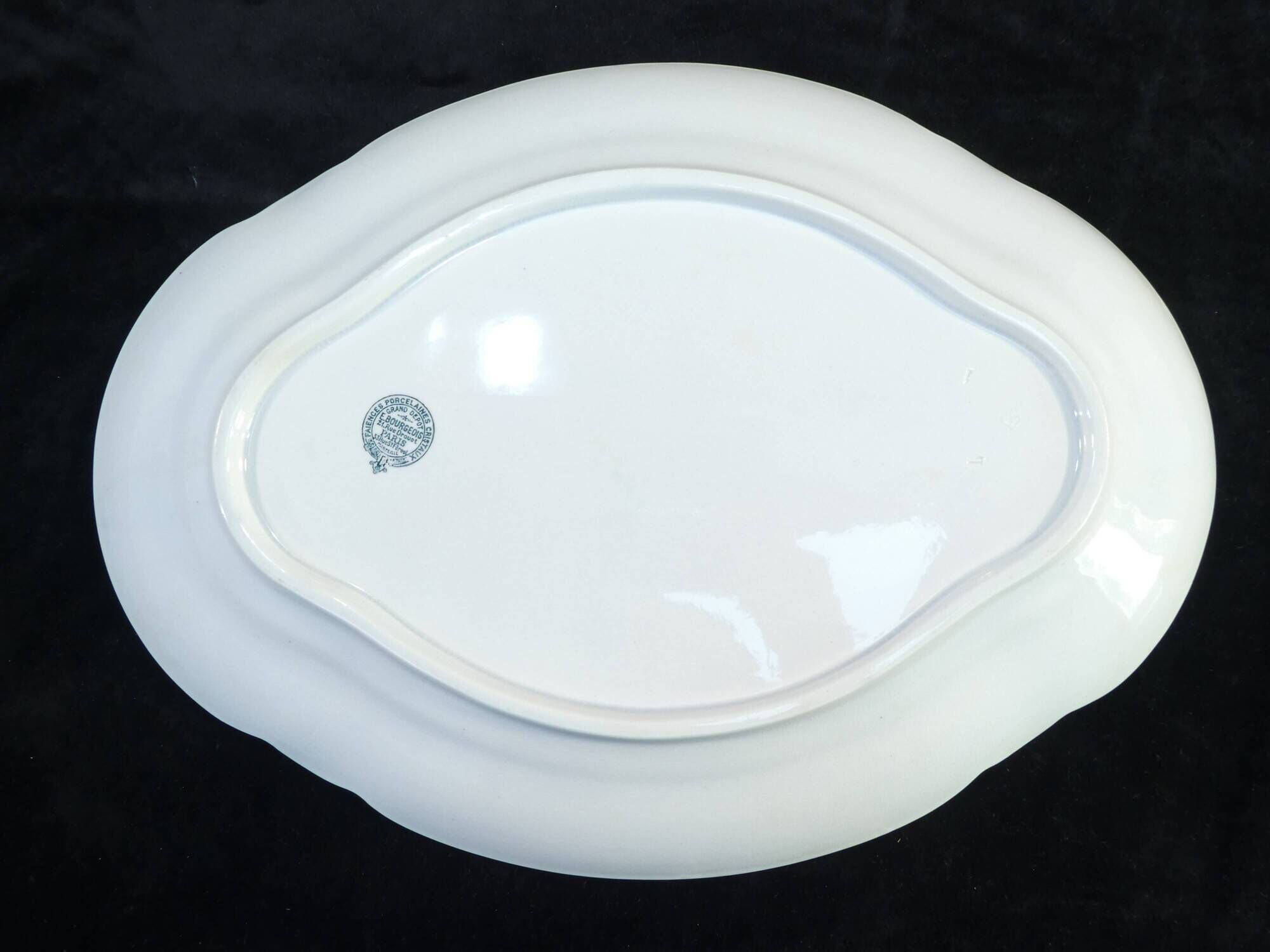 Emile BOURGEOIS PARIS Oval dish in faience floral motif