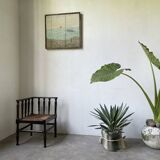 Straw chair by the fireside 1900