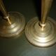 Pair of antique gilded brass candlesticks
