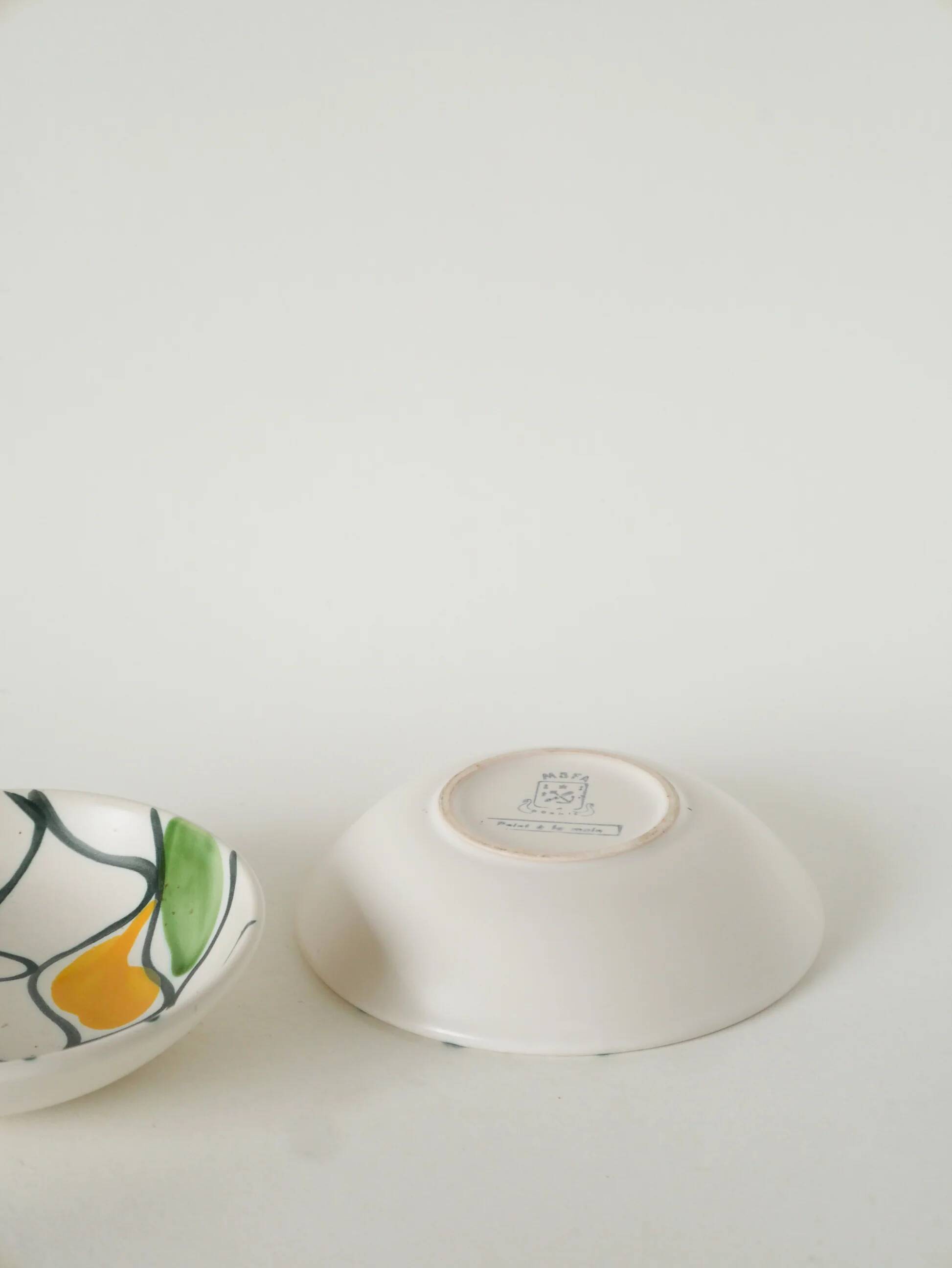 Pair of ceramic ramekins, abstract patterns in yellow, purple and green, Pornic model, 1960.