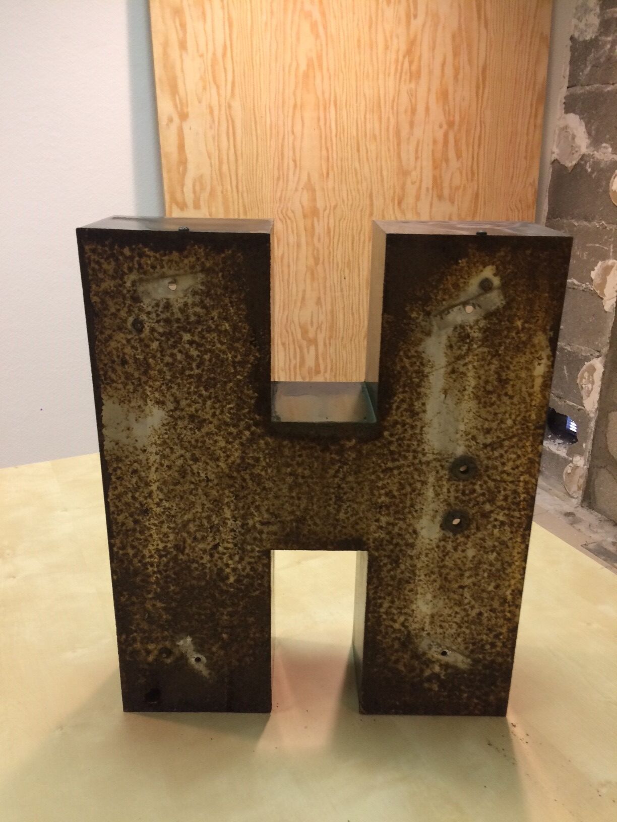 Large metal sign and plexi letter